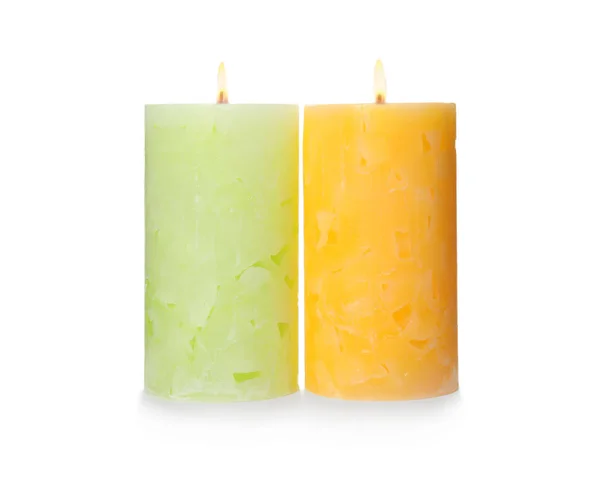 Alight color wax candles on white background — Stock Photo, Image