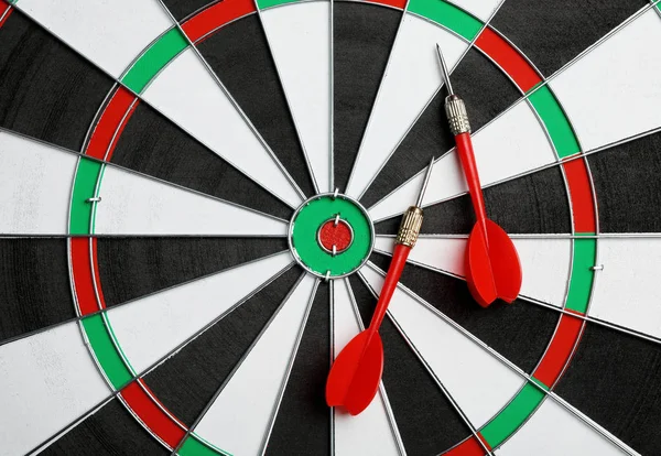 Dart board with color arrows, top view. Space for text — Stock Photo, Image