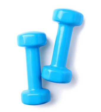 Beyaz arka planda renk dambıl. Ev fitness