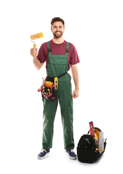 Ganzes Porträt eines professionellen Bauarbeiters mit Werkzeugen auf weißem Hintergrund — Stockfoto