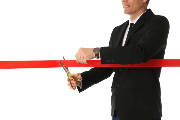 Hombre en traje de oficina corte cinta roja aislado en blanco, primer plano —  Fotos de Stock