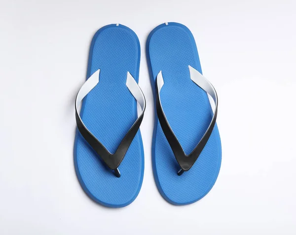 Pair of flip flops on white background, top view. Beach accessories — Stock Photo, Image