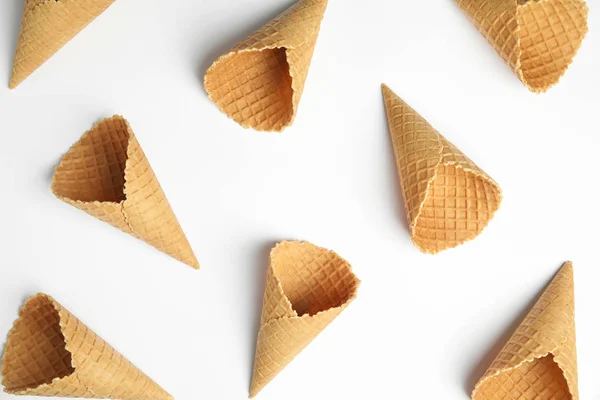 Waffle empty ice cream cones on white background, top view — Stock Photo, Image