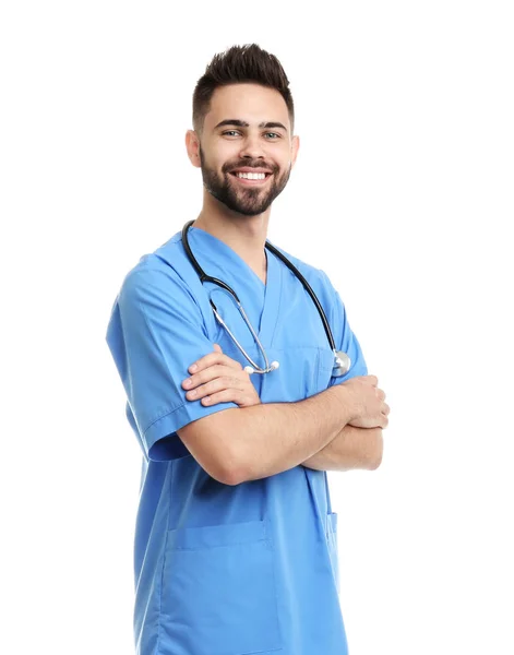 Young male doctor in uniform isolated on white — 스톡 사진