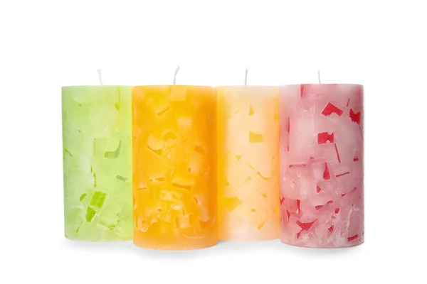 Four color wax candles on white background — Stock Photo, Image