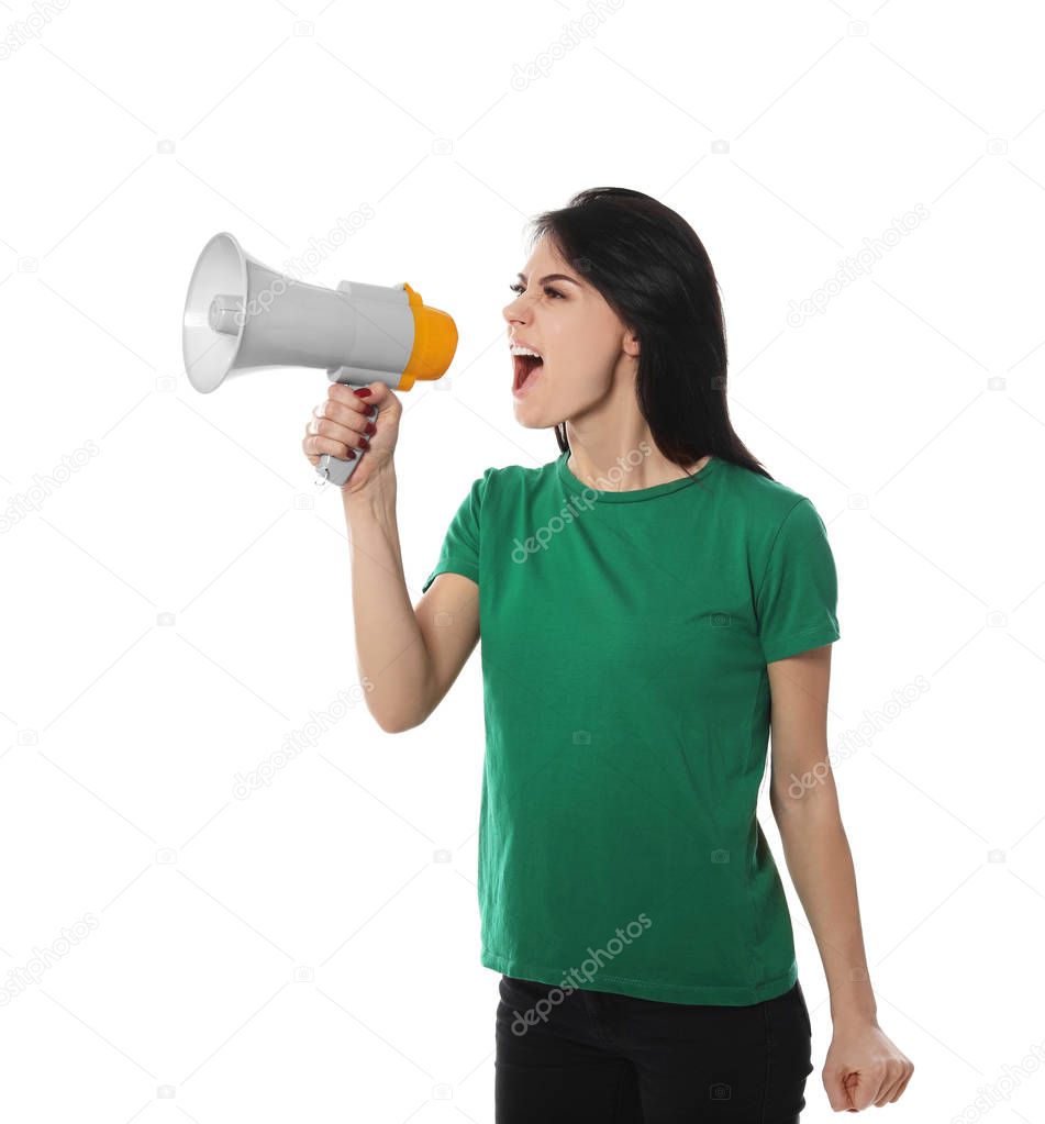 Portrait of emotional woman using megaphone on white background