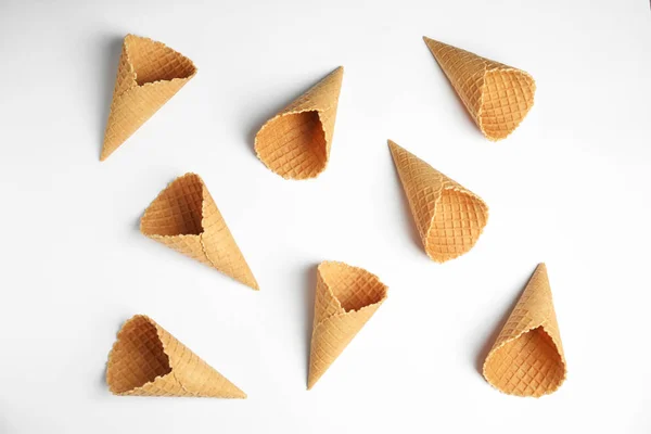 Waffle empty ice cream cones on white background, top view — Stock Photo, Image