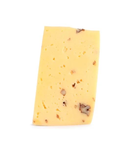 Pedaço de queijo delicioso com nozes no fundo branco — Fotografia de Stock