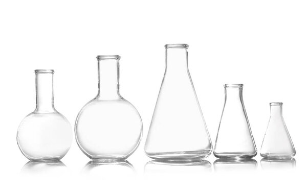 Group of empty chemistry glassware isolated on white