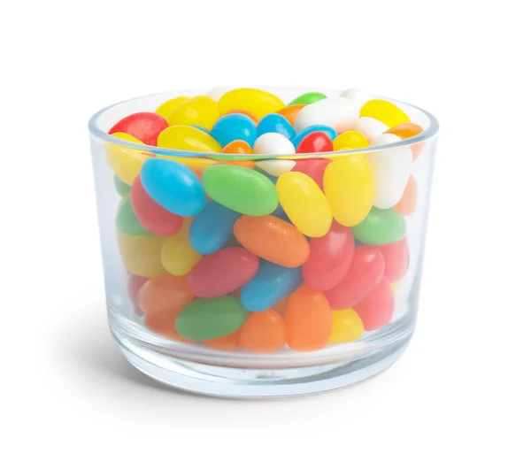 Glass of delicious color jelly beans isolated on white — Stock Photo, Image