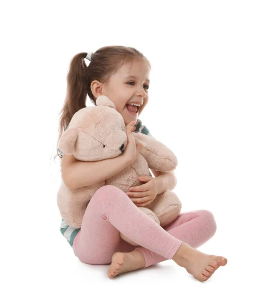 Portrait of cute little girl with teddy bear on white background — Stock Photo, Image