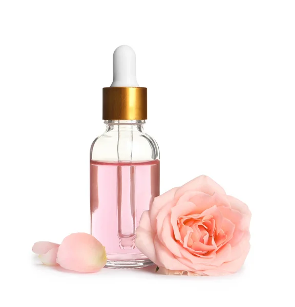 Butelka róży olejek Eterowy i kwiat na białym tle — Zdjęcie stockowe
