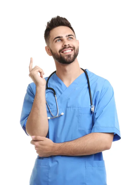 Joven médico en uniforme aislado en blanco —  Fotos de Stock