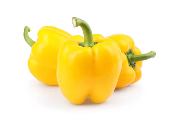 Ripe yellow bell peppers isolated on white — Stock Photo, Image