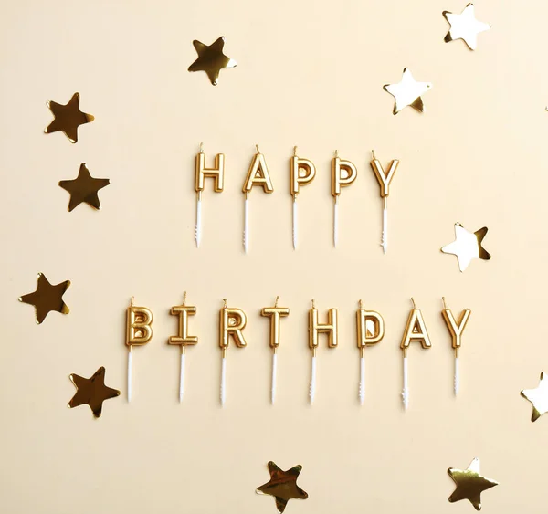 Flat lay composition with birthday candles on color background — Stock Photo, Image