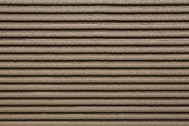 Arka plan olarak astarlı gri beton, üst görünüm. Kiremit montajı