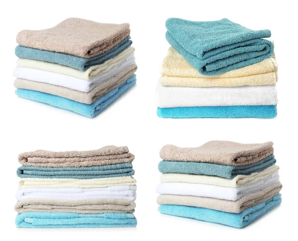 Conjunto de diferentes toallas de rizo suave sobre fondo blanco — Foto de Stock