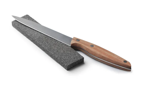 Острый утилитарный нож с шлифовальным камнем, изолированным на белом — стоковое фото