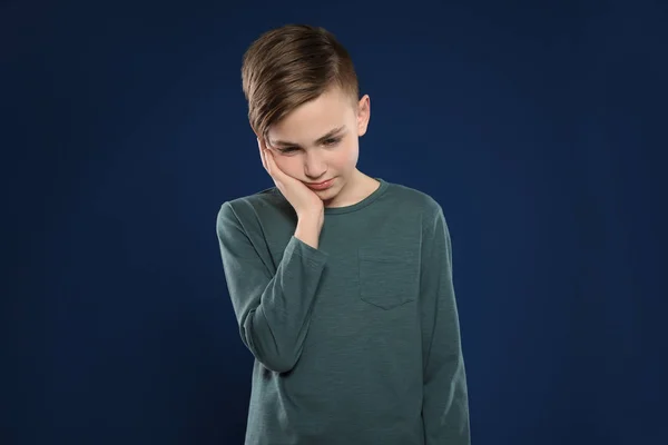 Portrait of emotional little boy on color background — Stock Photo, Image