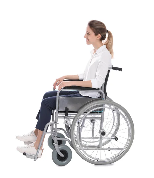 Mujer joven en silla de ruedas aislada en blanco —  Fotos de Stock
