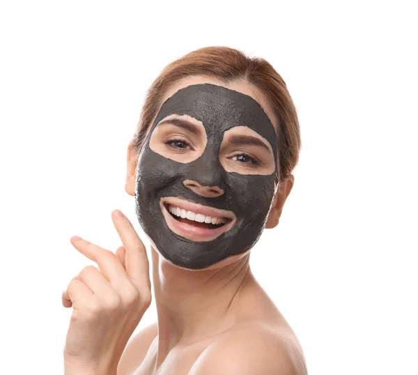 Mulher bonita com máscara preta no rosto contra fundo branco — Fotografia de Stock