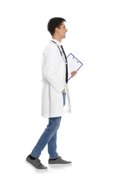 Full length portrait of medical doctor with clipboard and stethoscope isolated on white — Stock Photo, Image