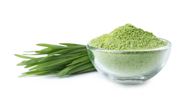 Fresh wheat grass and bowl with powder on white background — Stock Photo, Image