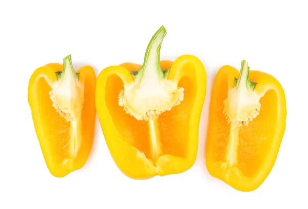 Skär gul paprika isolerad på vit, uppifrån — Stockfoto