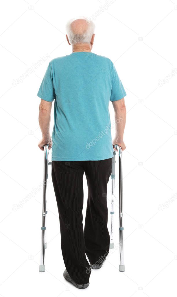 Elderly man using walking frame isolated on white, back view