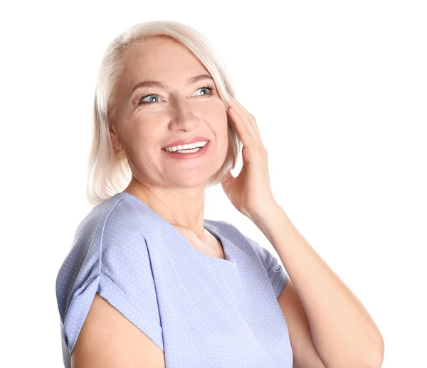 Portrait of charming mature woman with healthy beautiful face skin and natural makeup on white background — Stock Photo, Image