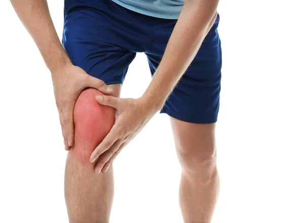 Man met knieproblemen op witte achtergrond, close-up — Stockfoto