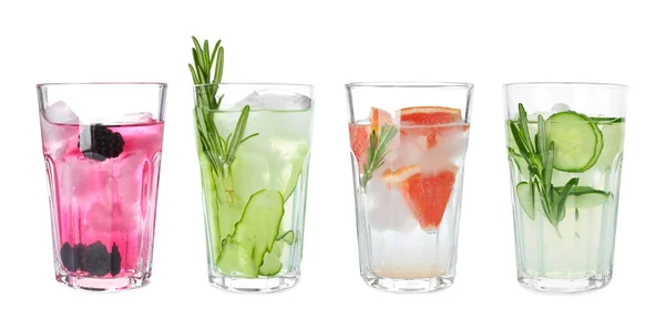 Set de vasos con diferentes bebidas refrescantes sobre fondo blanco — Foto de Stock