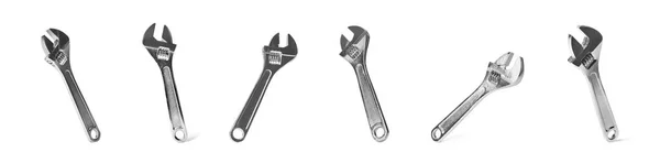 Set of adjustable wrenches on white background. Construction tools — Stock Photo, Image