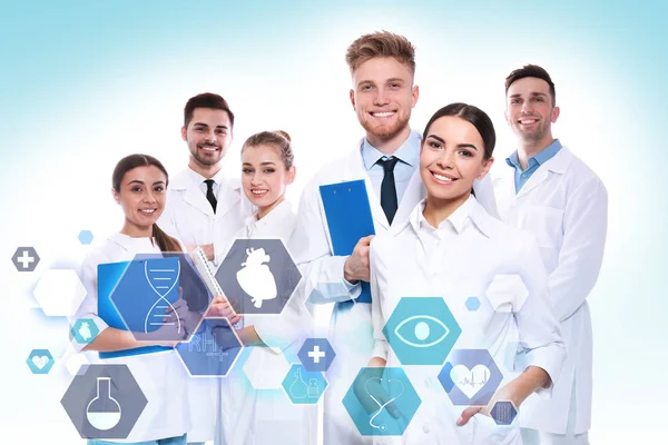 Group of doctors and icons on light background. Medical service