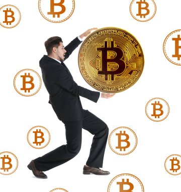 Beyaz arka planda bitcoin ile genç işadamı