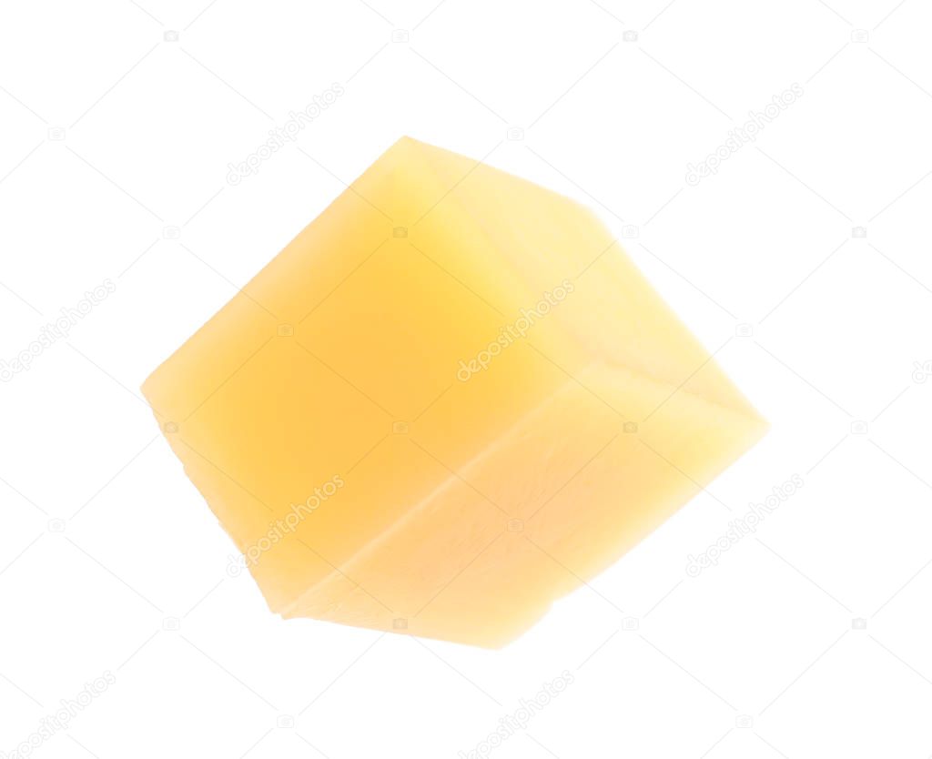 Cube of delicious cheese isolated on white