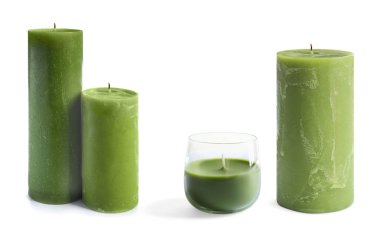 Beyaz arka plan üzerinde balmumu yeşil mumlar ile ayarlayın