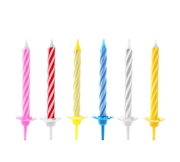 Set con diferentes velas de cumpleaños sobre fondo blanco — Foto de Stock