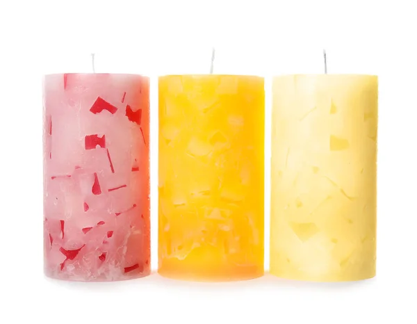 Three color wax candles on white background — Stock Photo, Image