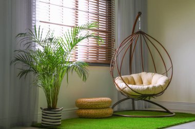 Salıncak sandalyeli şık ve modern oda iç mekan