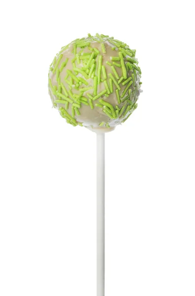 Tasty cake pop with green sprinkles isolated on white — Stock Photo, Image