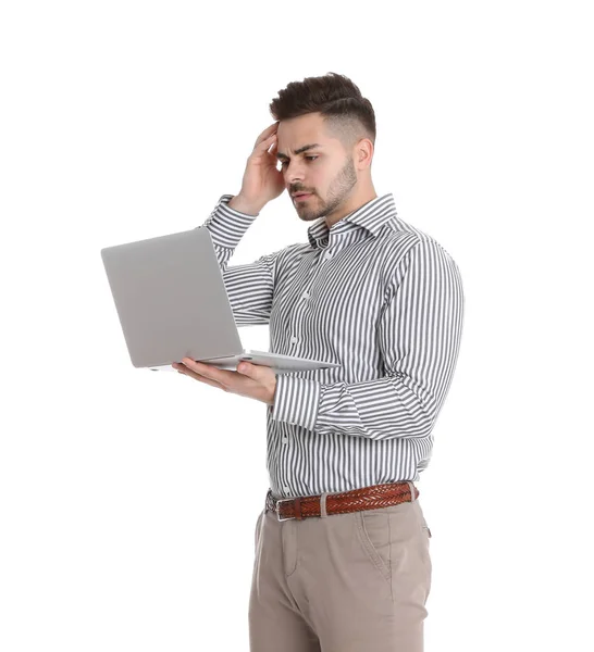 Homem emocional com laptop no fundo branco — Fotografia de Stock