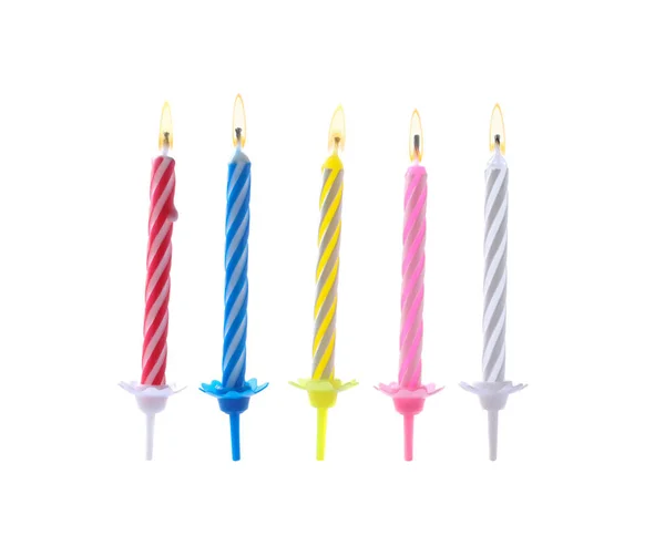 Barevné narozeninové svíčky na bílém pozadí — Stock fotografie