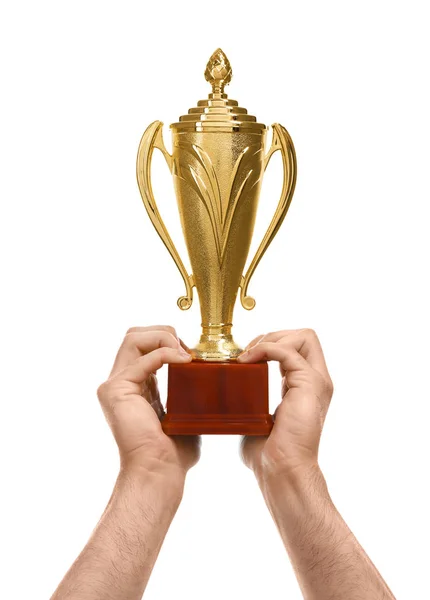 Young man holding gold trophy cup on white background, closeup — Stock Photo, Image