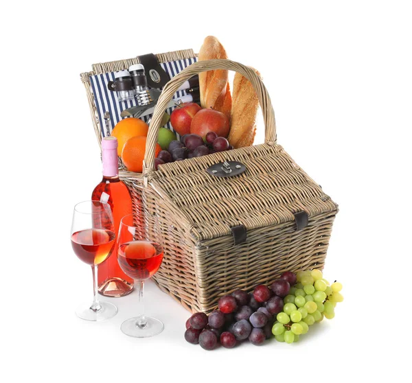 Wicker picnic basket with different products on white background — Stock Photo, Image