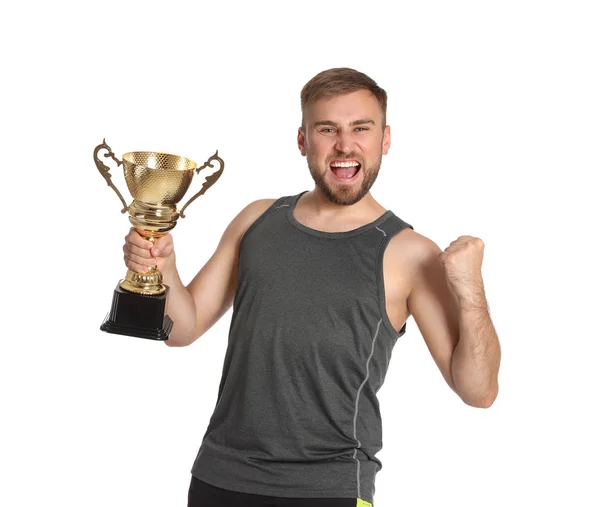 Portret szczęśliwego młodego sportowca ze złotym kubcem trofeum na białym tle — Zdjęcie stockowe