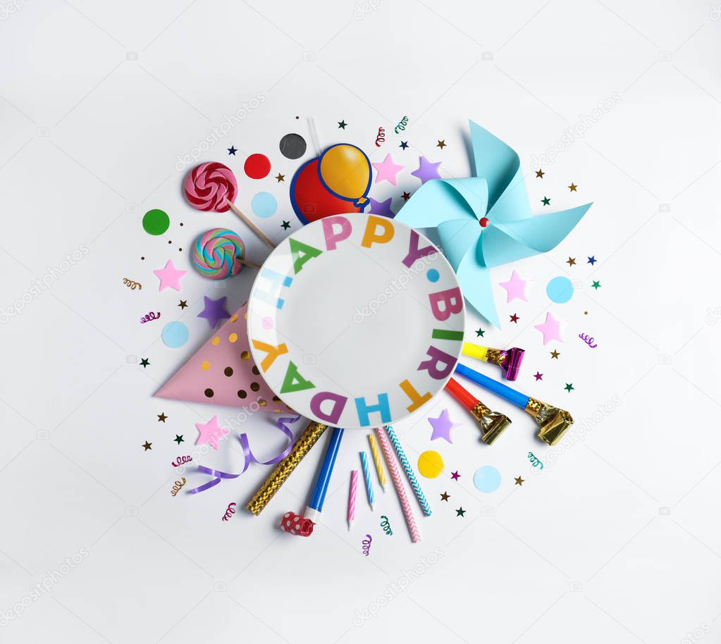 Composition with birthday party items on white background, top view. Space for text