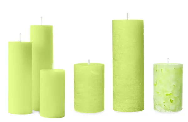 Set with wax candles on white background — Stock Photo, Image