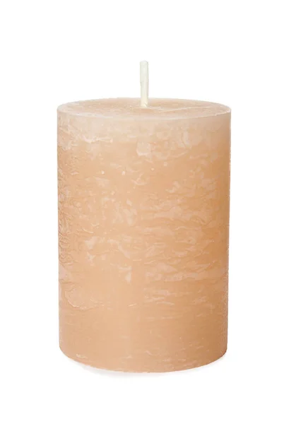 Uma vela de cera de cor no fundo branco — Fotografia de Stock