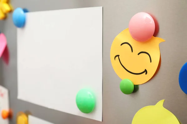 Sheets of paper and magnets on refrigerator door, closeup. Space for text — Stock Photo, Image